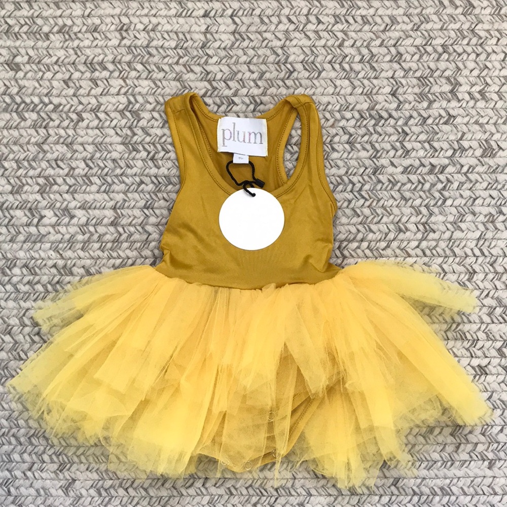 I love Plum (Plum NYC) gold tutu. NEW with tags.